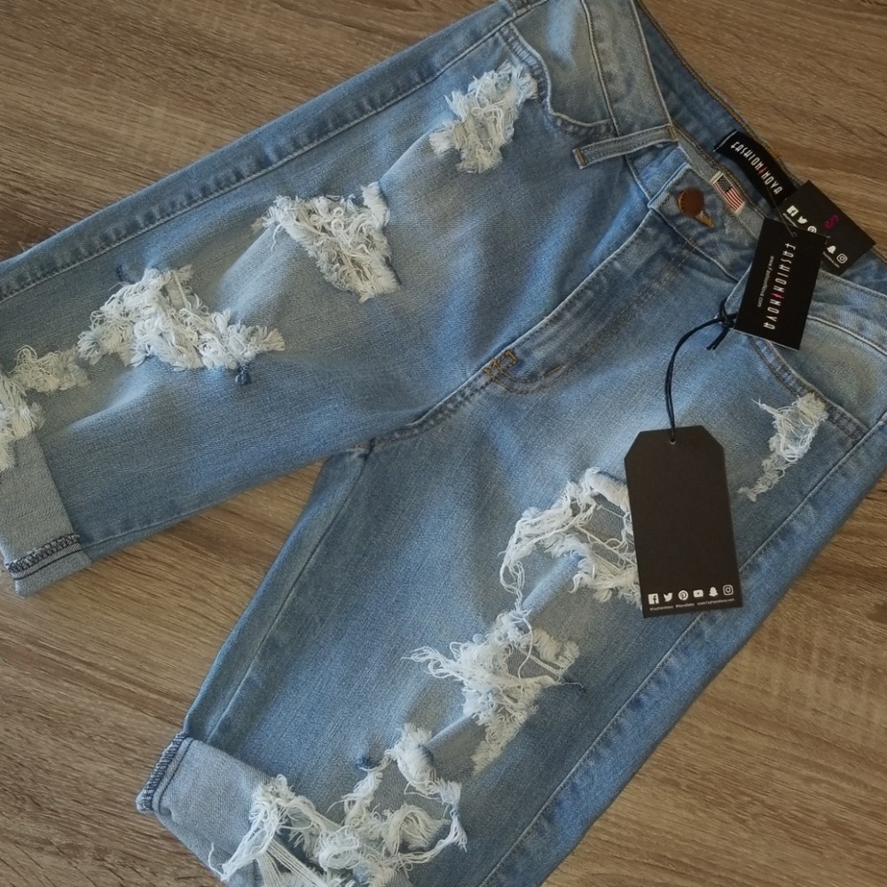 Distressed bermuda jean shorts